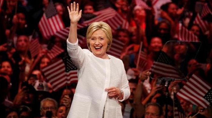 Clinton declares victory in Democratic race, hails a milestone