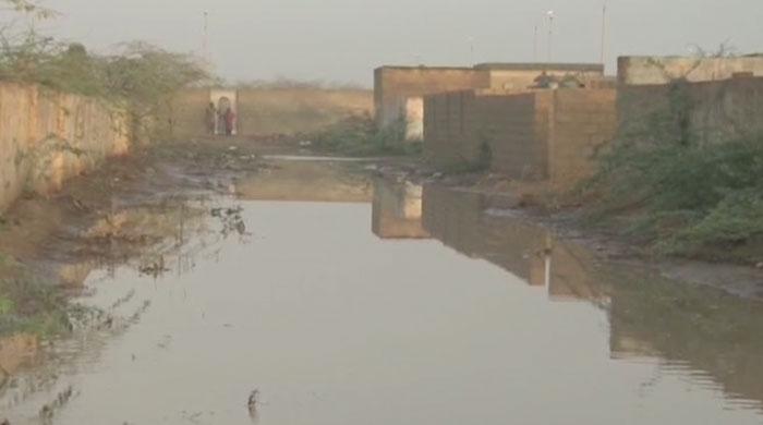 Rainwater inundates Saadi Town in Karachi