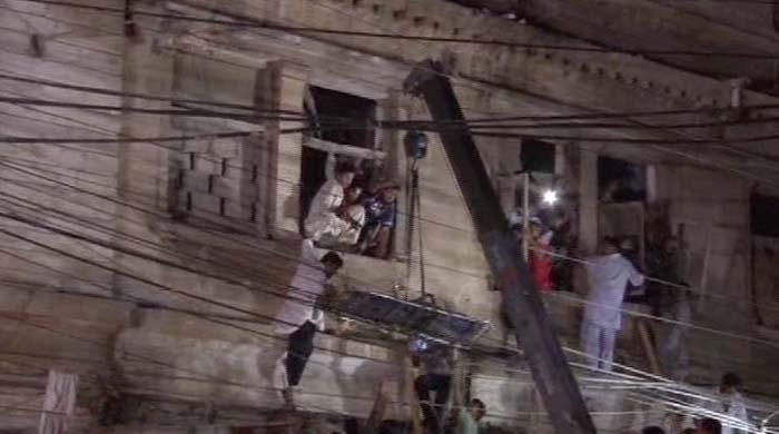 Woman killed, six hurt as old building partially collapses in Karachi
