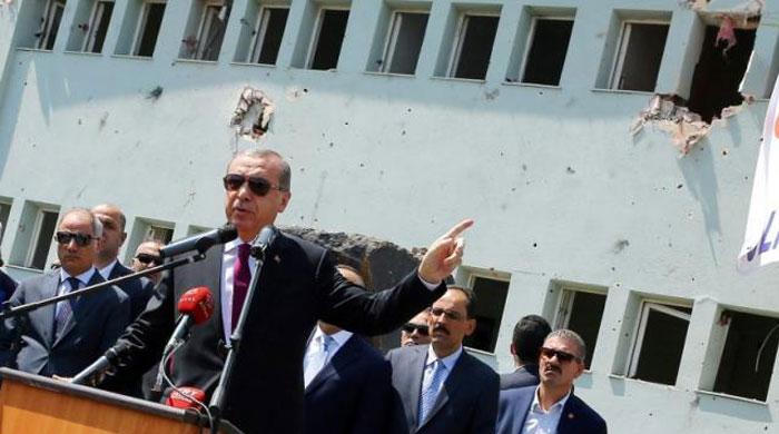 Erdogan says to close military schools, rein in armed forces