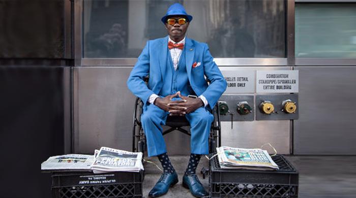 The most dapper newspaper salesman you will ever see