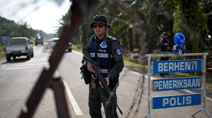 Three arrested in Malaysia over planned attacks on eve of independence day