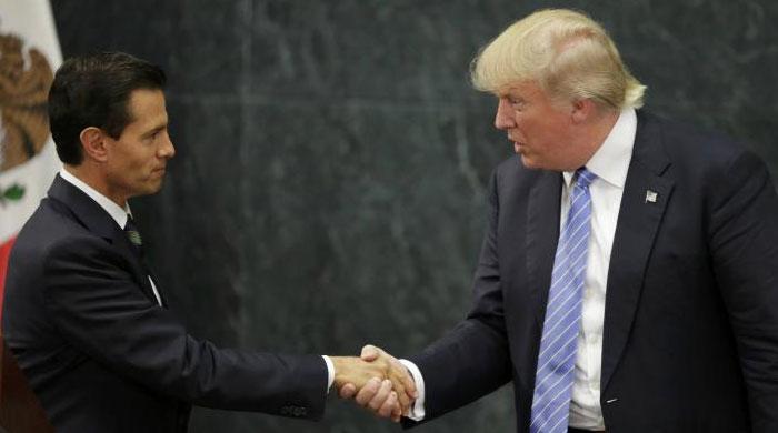 Mexico contradicts Trump on paying for border wall, clouding visit