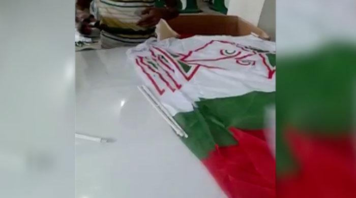 MQM founder's name removed from party flags