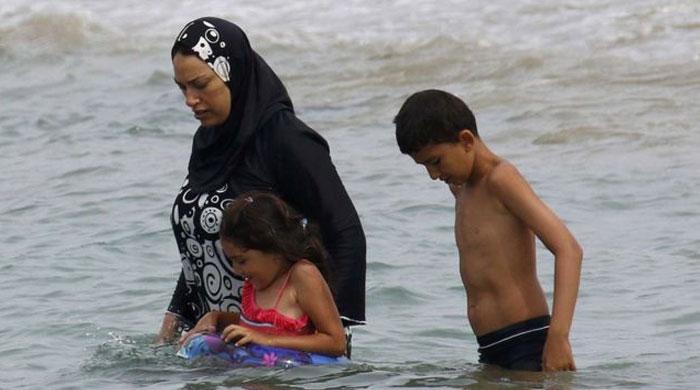 French city Nice suspends burkini ban after defiance