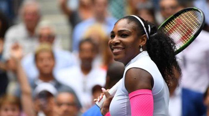 Serena storms into U.S. Open last 16 with milestone win