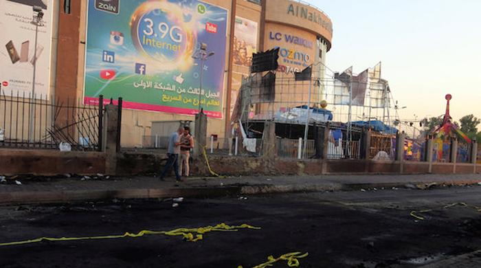 Bombings near Baghdad mall kill at least 13 people