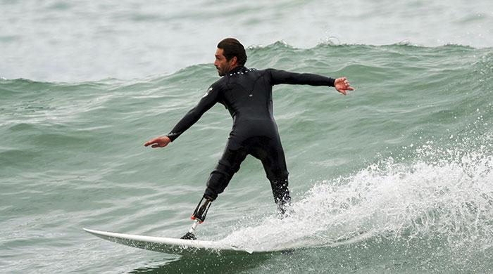French amputee surfs again in 'revenge' on shark