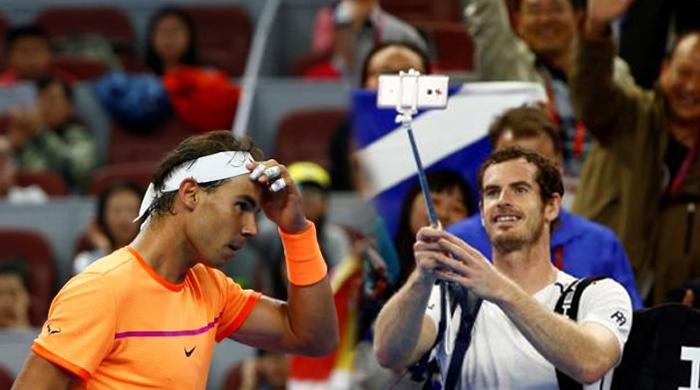 Murray and Nadal ease into second round of China Open