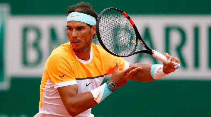Nadal eases into quarters during rain-hit day at China Open