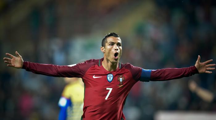 Ruthless Ronaldo hits four for Portugal, while France and Dutch run riot in World Cup qualifiers