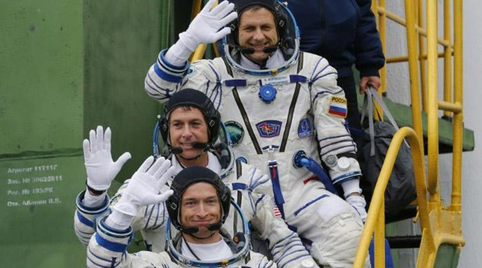 Two Russians, one American blast off to International Space Station