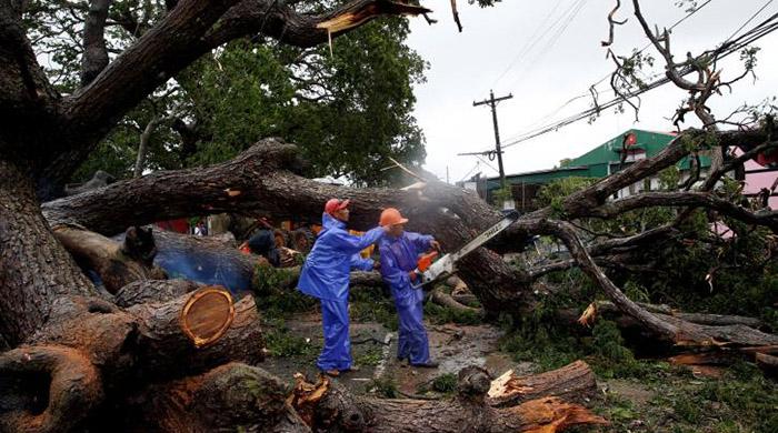 Over 90,000 people flee as Typhoon Haima slams northern Philippines