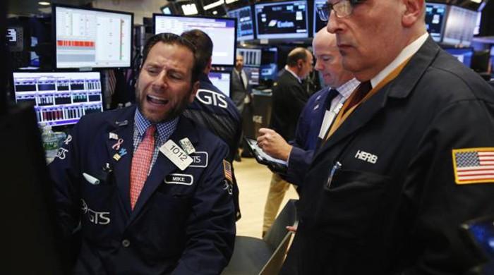Wall St. falls as FBI to review more Clinton emails Wall St. falls as FBI to review more Clinton emails