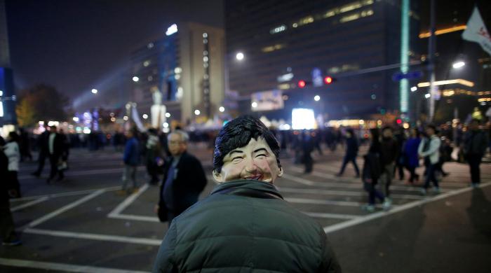 Huge protest urges scandal-hit S. Korea president to quit