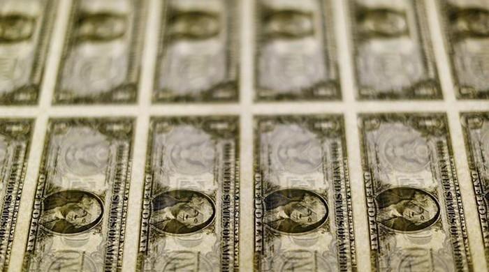 US dollar jumps in Asia as FBI clears Clinton