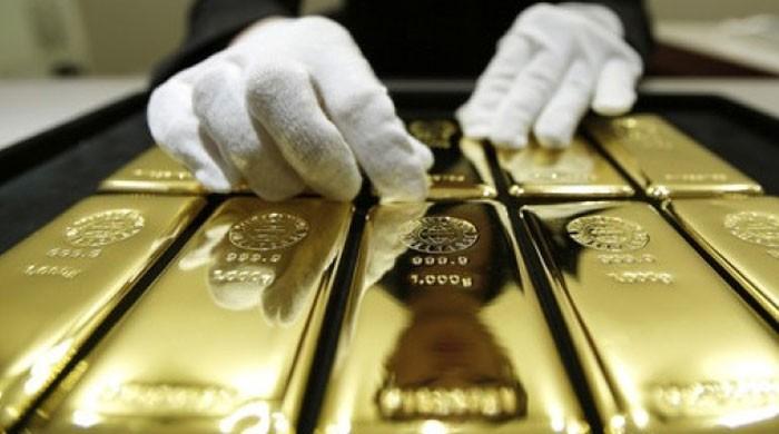 Gold zooms, oil swoons as Trump's win roils risky assets