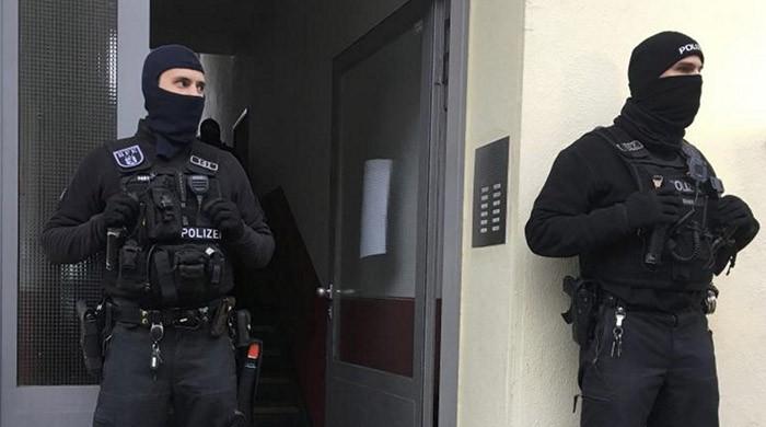 Police raid mosques, flats across Germany as government bans Islamist group