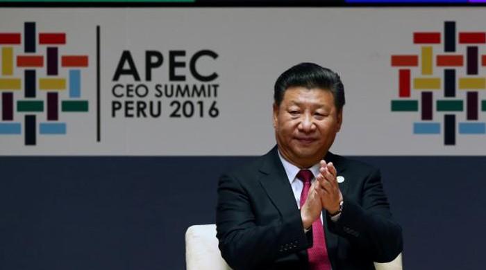 China pledges further opening as leaders scramble for free trade