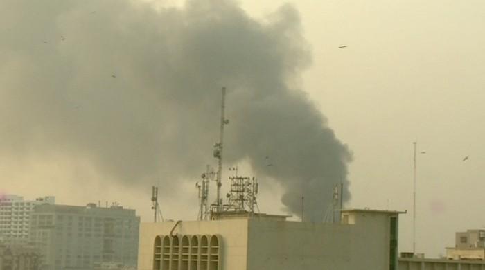 Building fire eventually brought under control near Karachi's city courts