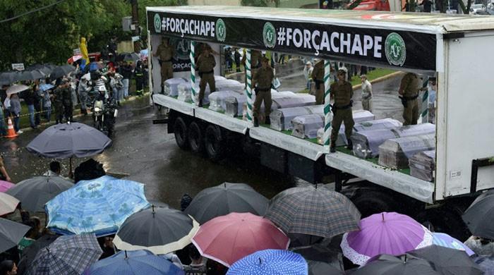 Brazil mourns fallen football team in pouring rain