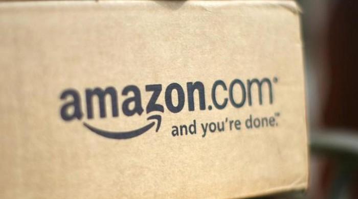 Amazon opens line-free grocery store in challenge to supermarkets