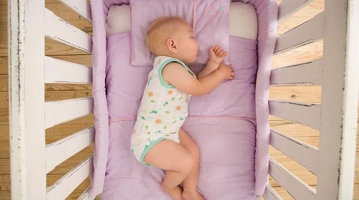 Crib ads often show babies in unsafe sleep settings