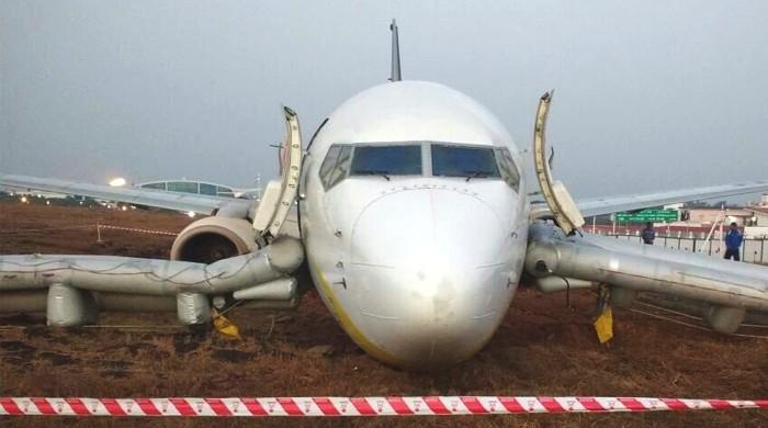 Indian passenger plane skids off runway, injuring 15
