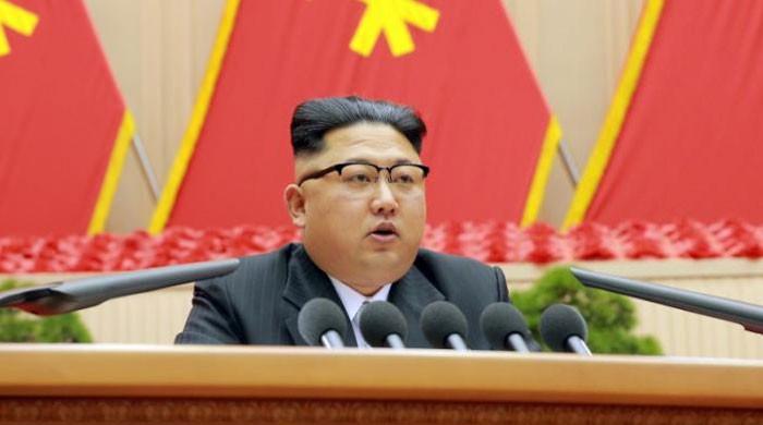 North Korea's Kim says close to test launch of ICBM