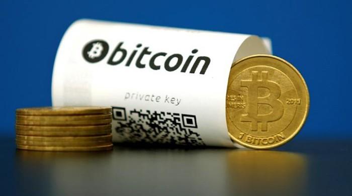 Bitcoin jumps above $1,000 for first time in three years