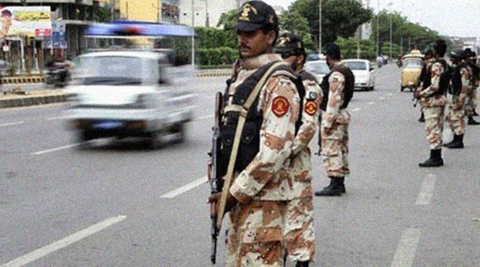 Rangers recover 'MQM militant wing' weapons from Karachi graveyard