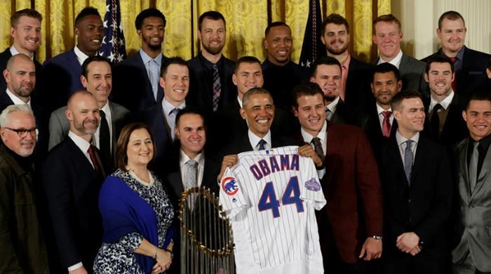 Obama fetes world-champion Chicago Cubs, his (wife's) favorite