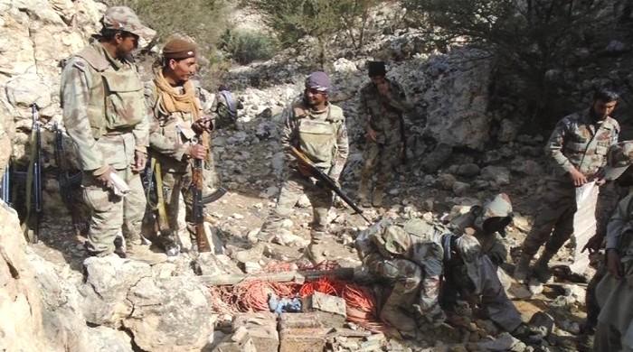 Image result for Large amount of arms & ammunition recovered from BLA hideout: ISPR