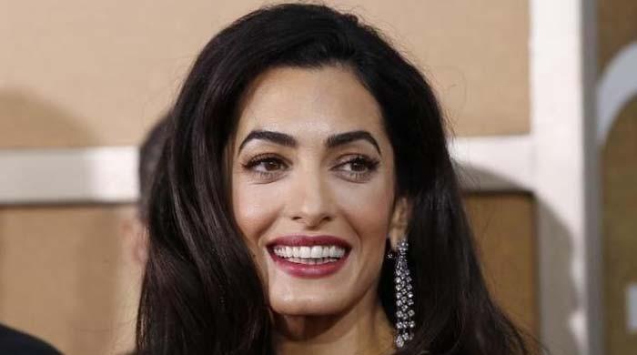 Amal Clooney pregnant with twins: family friend