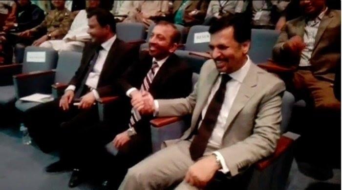 Mustafa Kamal and Farooq Sattar shake hands