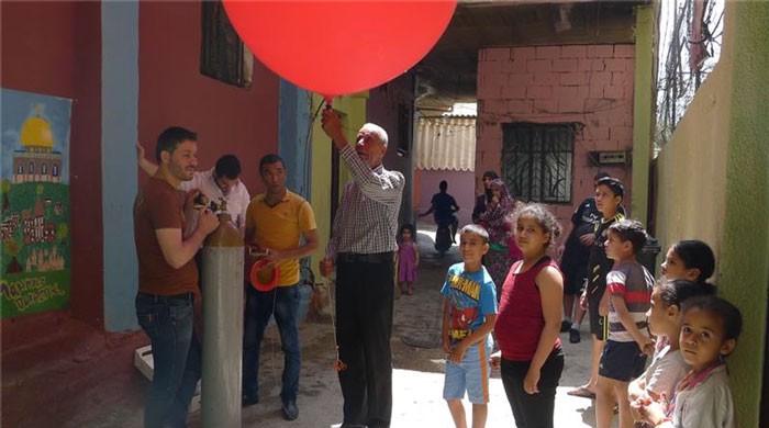 Palestinian refugee uses balloon and camera to create aerial map