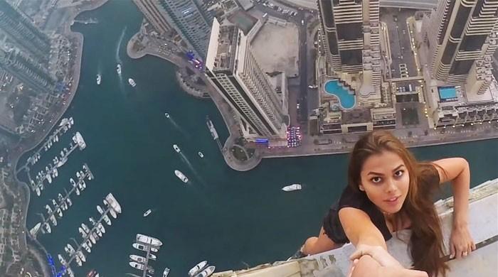 Dubai police summon Russian model who dangled from skyscraper: newspaper