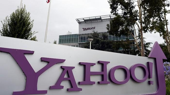 Yahoo price slashed as Verizon proceeds with buy