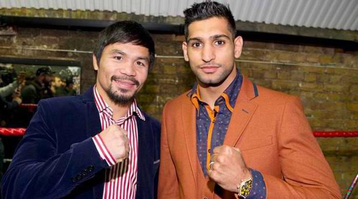 Manny Pacquiao 'in negotiations' to fight Amir Khan
