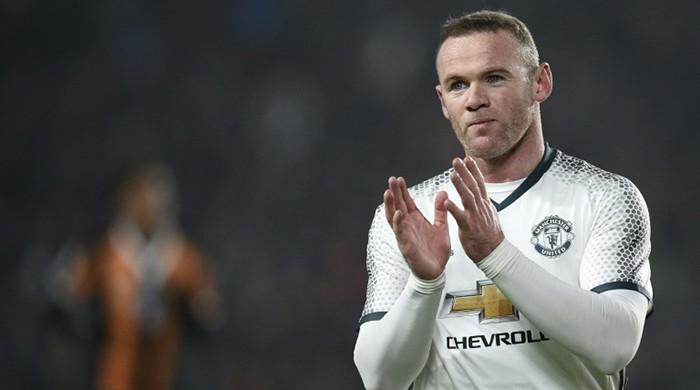 I'm staying at Manchester United, says Rooney