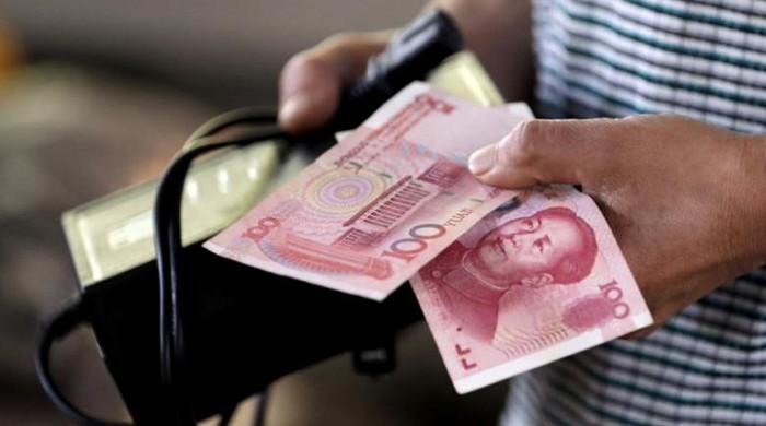 China says no intention of using currency devaluation to its advantage