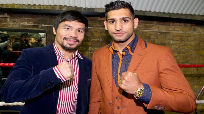 Amir Khan to fight Manny Pacquiao in April