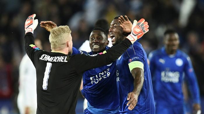 Schmeichel thwarts Sevilla as Leicester rekindle fairytale