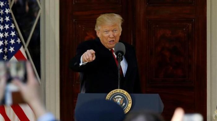 Trump calls court decision blocking revised travel ban 'judicial overreach'