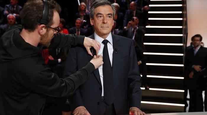 Fillon criticises Merkel refugee policies in French TV debate