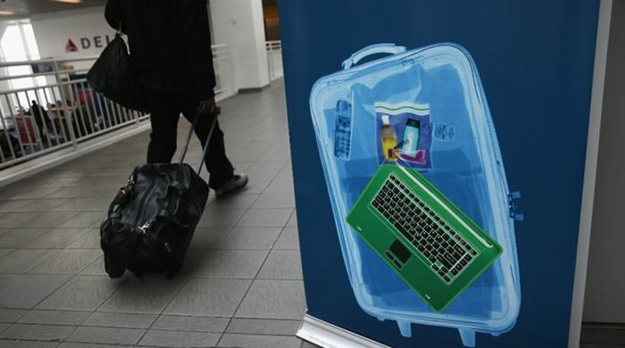 US bans laptops, tablets from cabins on flights from Middle East