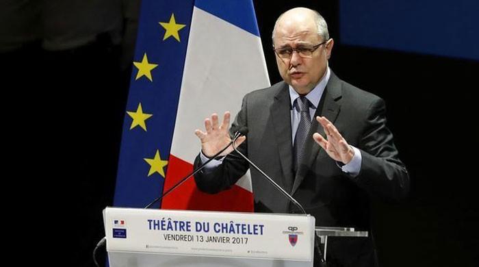 French interior minister resigns over payments to daughters