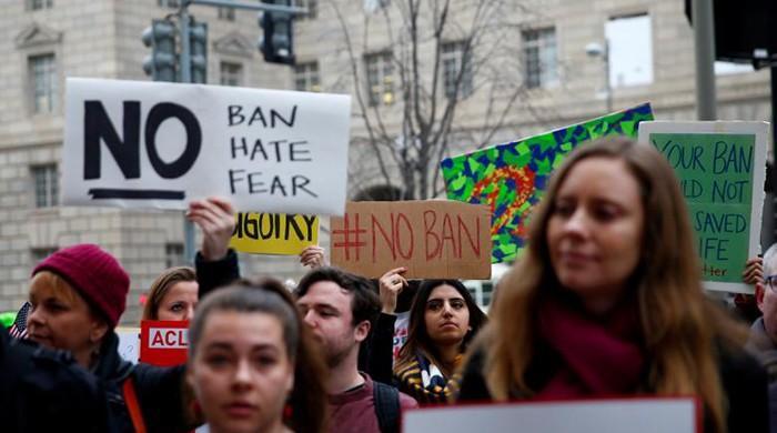 Virginia court rules for Trump in travel ban dispute, order still halted