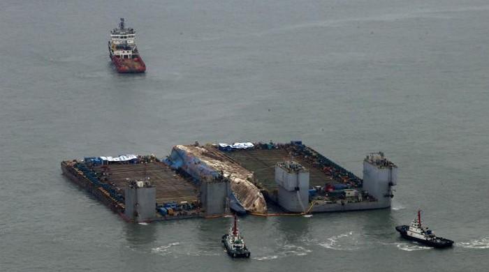 Overloaded South Korean Ferry Sunken 3 Years Ago Emerges In Grey Sea