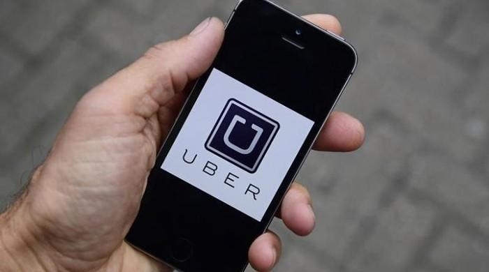Uber halts services in Denmark after new taxi law